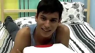 Cute twink is playing with his cock by means of an interview