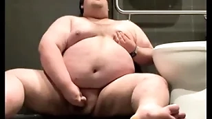 Chubby plays in public bathroom