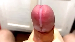 Cumming in close-up with a massive portion of cum in halt motion / big uncut veiny cock / pissing