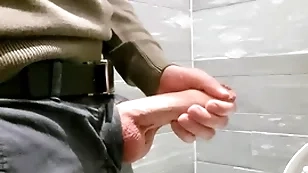 Horny handy the mall. masturbating in the advance a earn restroom.
